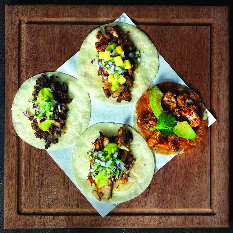 The taco selection includes al pastor, carne asada, pollo asado and more