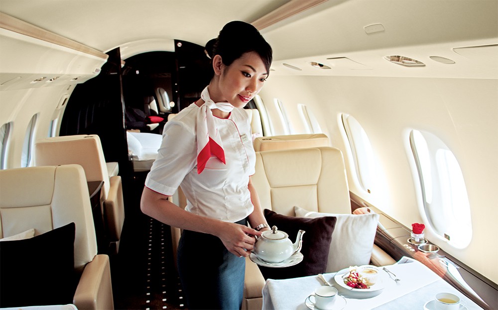 Each VistaJet aircraft has a cabin hostess and bespoke in-flight dining services