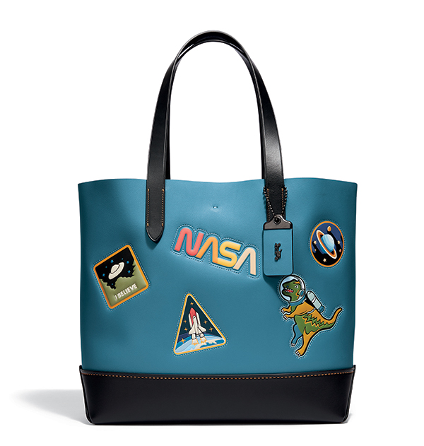 This men's Gotham Tote with space motif is a playful take on American pop culture.