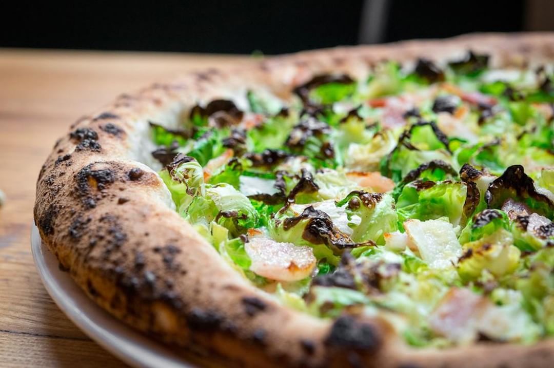Order Motorino's Brussels sprouts pizza minus the ham for your daily dose of greens and fibre