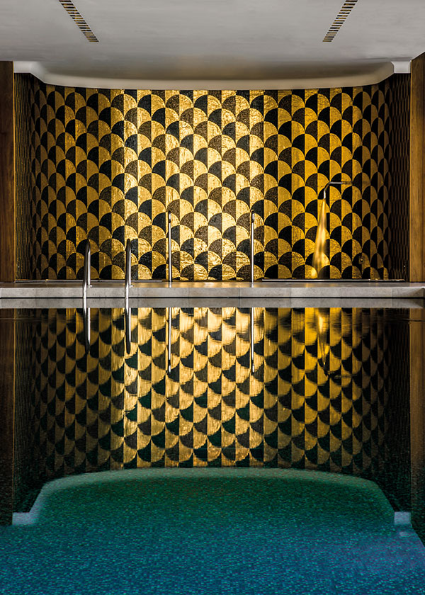 The vitality pool with real gold mosaic at the Bulgari Spa