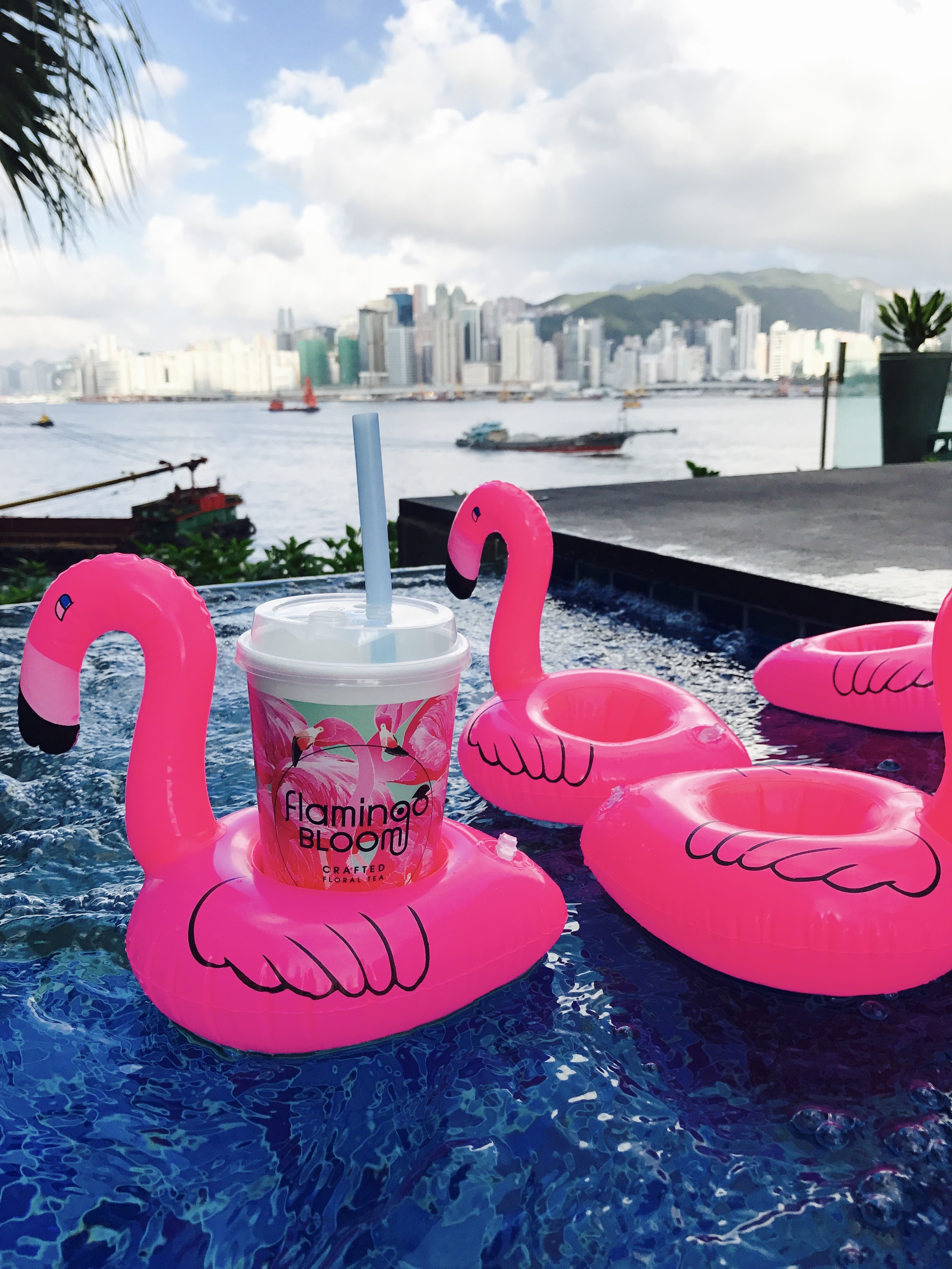 A drink from Flamingo Bloom floats on an inflatable flamingo (credit: Time Out)