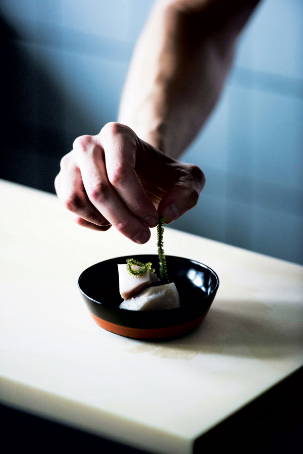 Placing the finishing touches on an omakase dish (photo by Jason Lang)