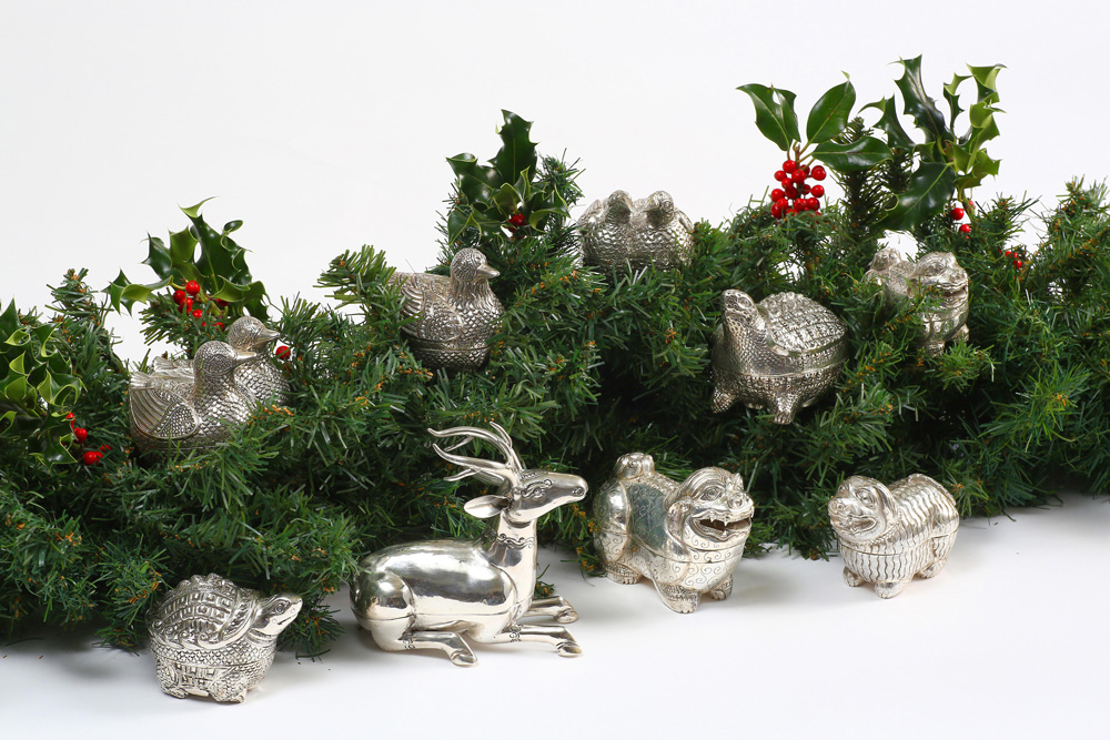 Hand-made silver animals to set a woodland tone