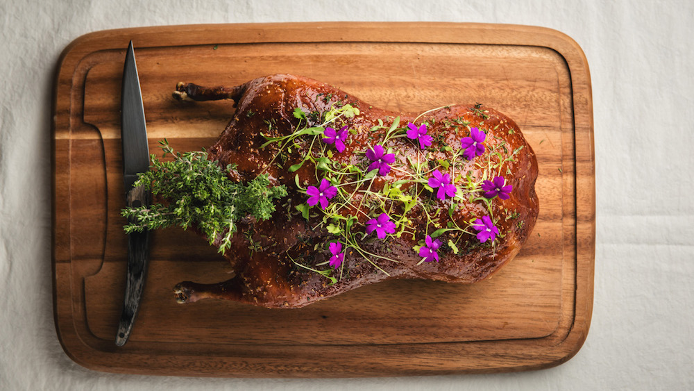 Whole roasted challans duck with spiced orange glaze, a more traditionally French dish