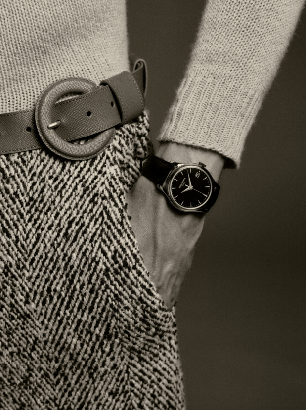 Calatrava Automatic Date Black Dial 5227G-010 _ Patek Philippe; Knit roll-neck, wool trousers and belt _ Prada