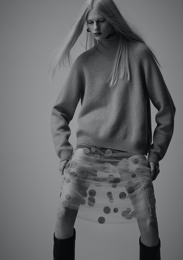 Rollneck jumper, tulle skirt, knee- high boots and earrings _ Fendi; Shorts _ Pleasing