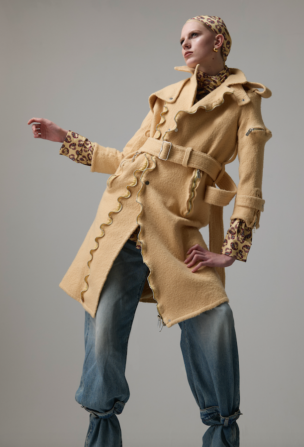 Yellow wool coat, and paisley silk shirt and headscarf _ Burberry; Blue denim jeans _ Haikure; Gold earrings _ Christian Dior