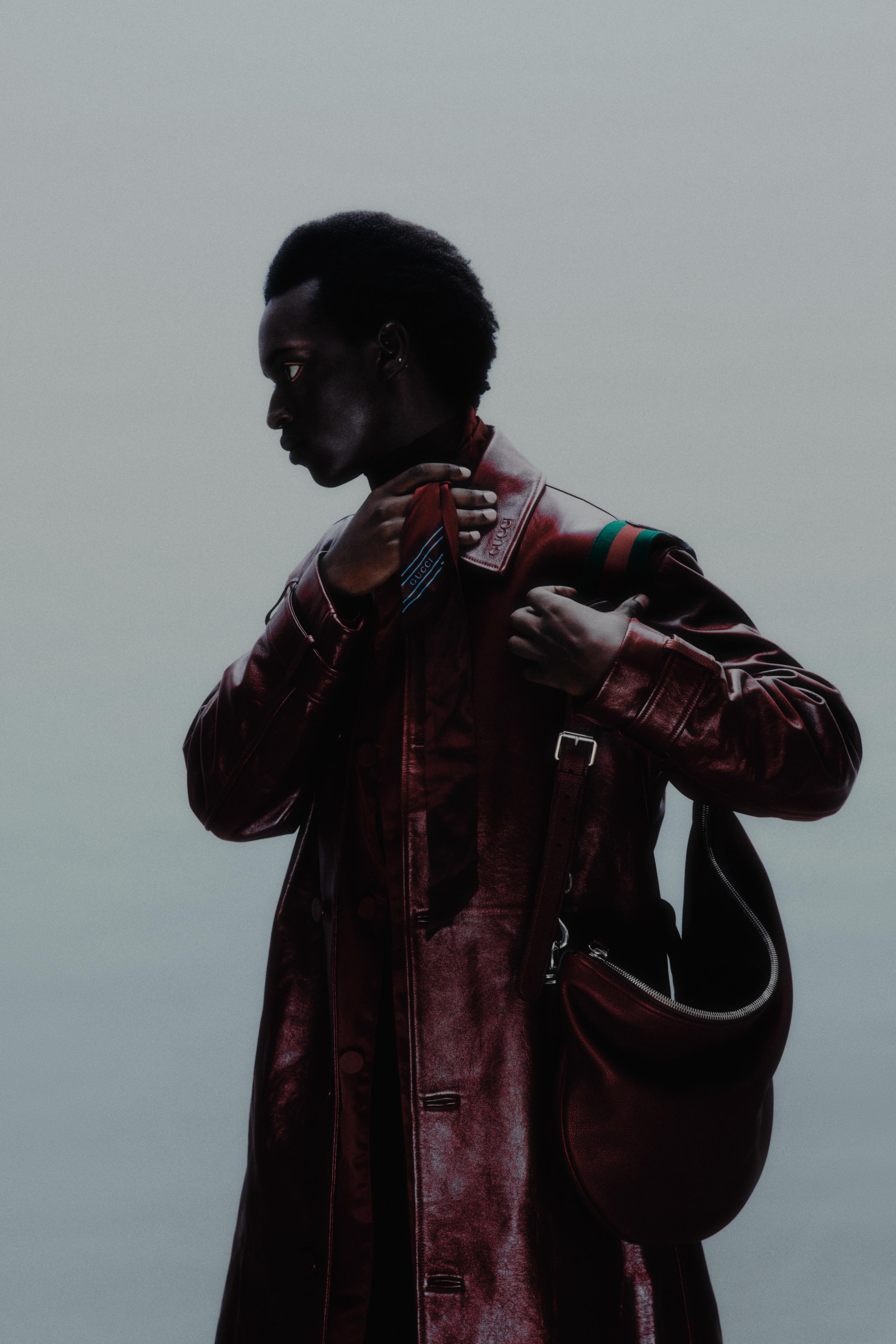 Rosso Ancora red coat, shirt and choker; and B small crossbody bag _ Gucci