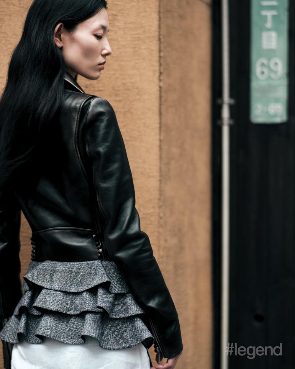 Black leather jacket, and black and white deconstructed skirt _ Prada