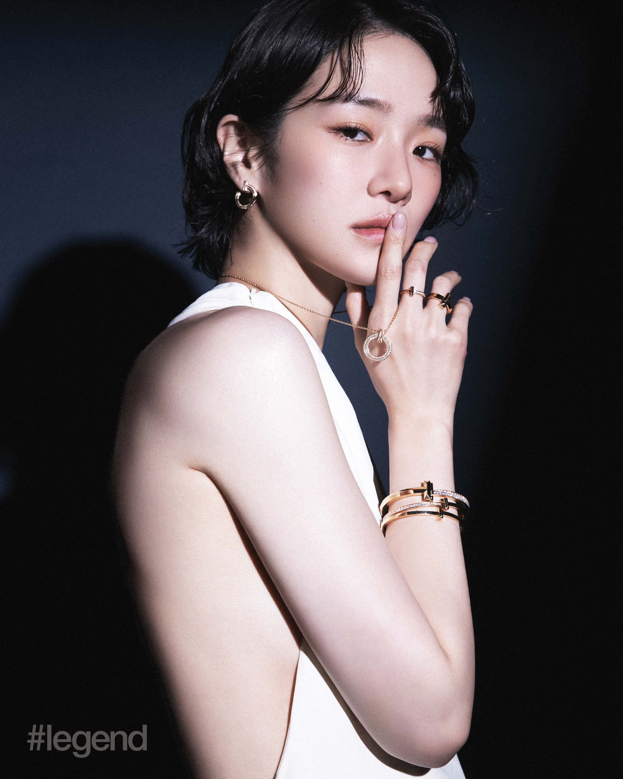 Tiffany T T1 earrings, pendant, bangles and ring in rose gold with diamonds, and bangle and ring in rose gold _ Tiffany & Co.; Ivory acetate viscose sable dress _ Gucci