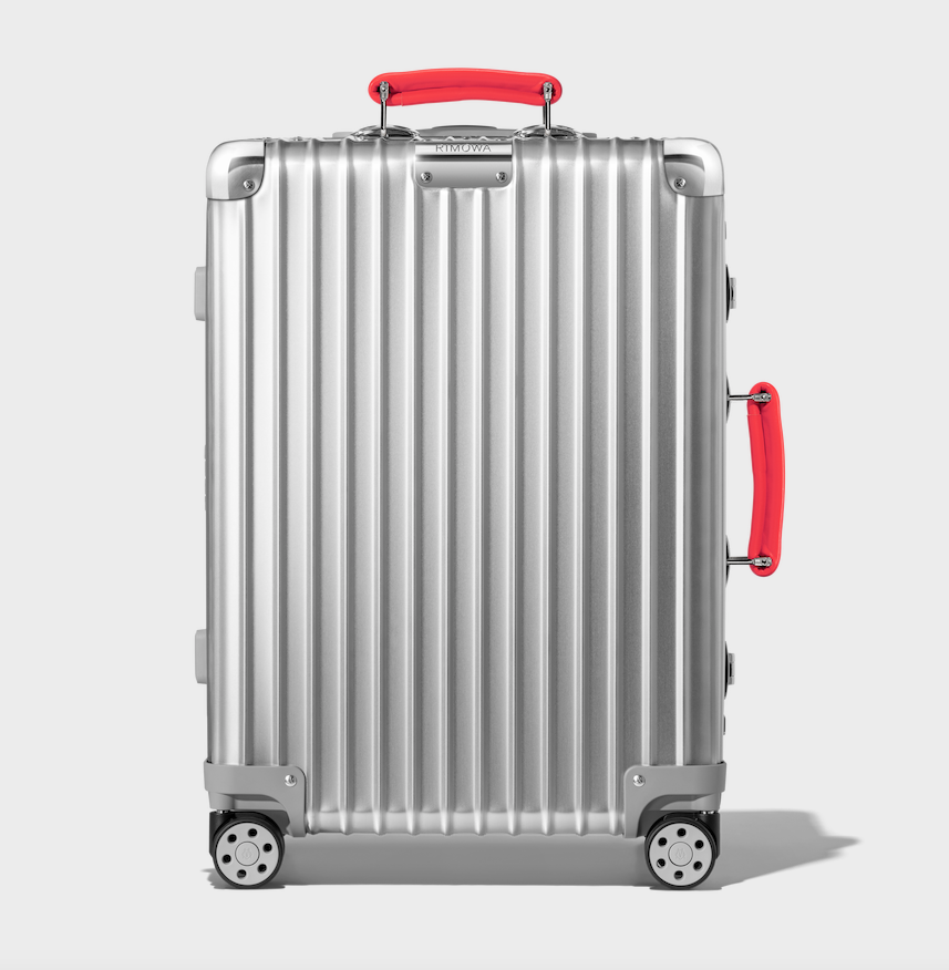 Classic Cabin suitcase in silver with red handles _ Rimowa