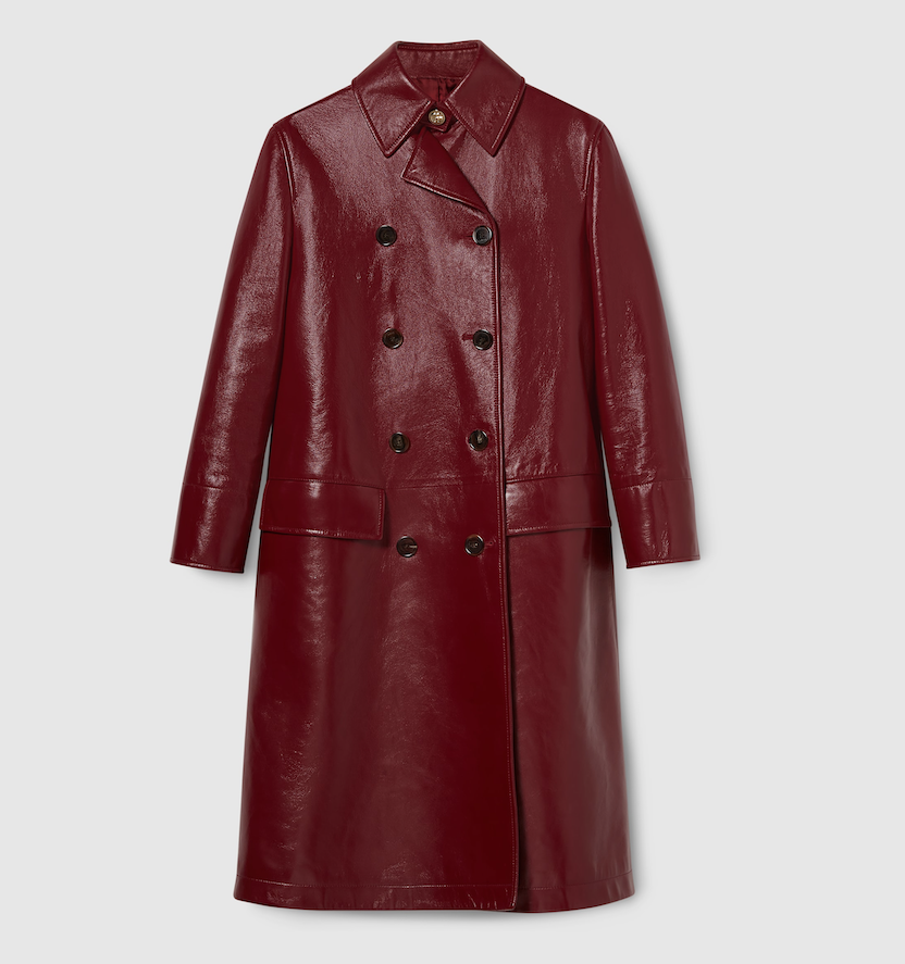 Rosso Ancora red leather coat _ Gucci; Burgundy leather bag _ Bottega Veneta; Red leather slingbacks _ Prada; Red puff-sleeve sweater _ Frame; Burgundy miniskirt _ Sandro