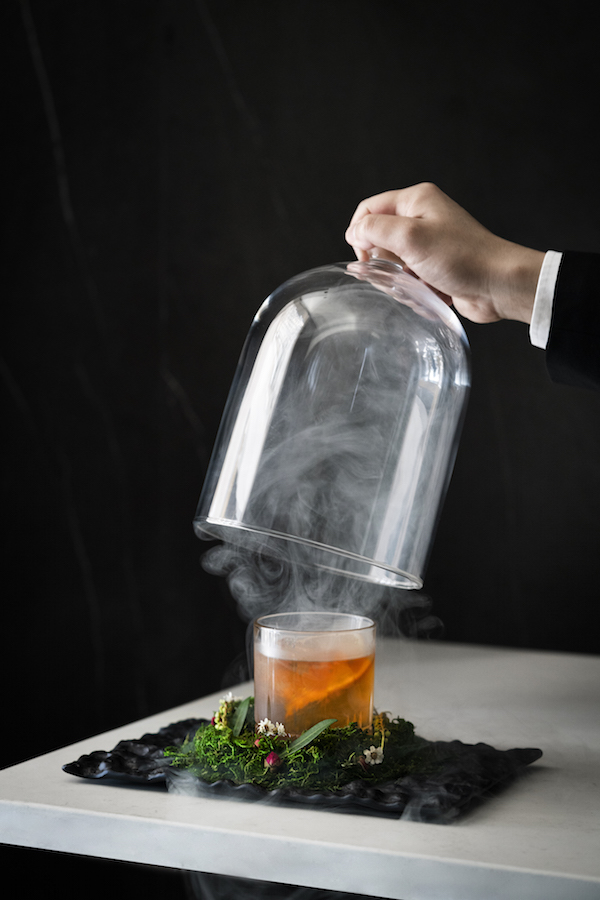 Above the Clouds, a signature cocktail from The Aviary Collection
