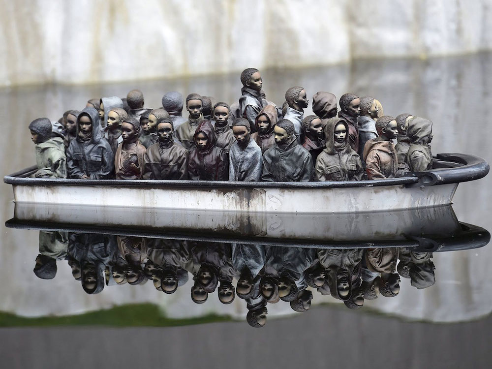 Banksy's raffling his Dismaland refugee boat for a good cause