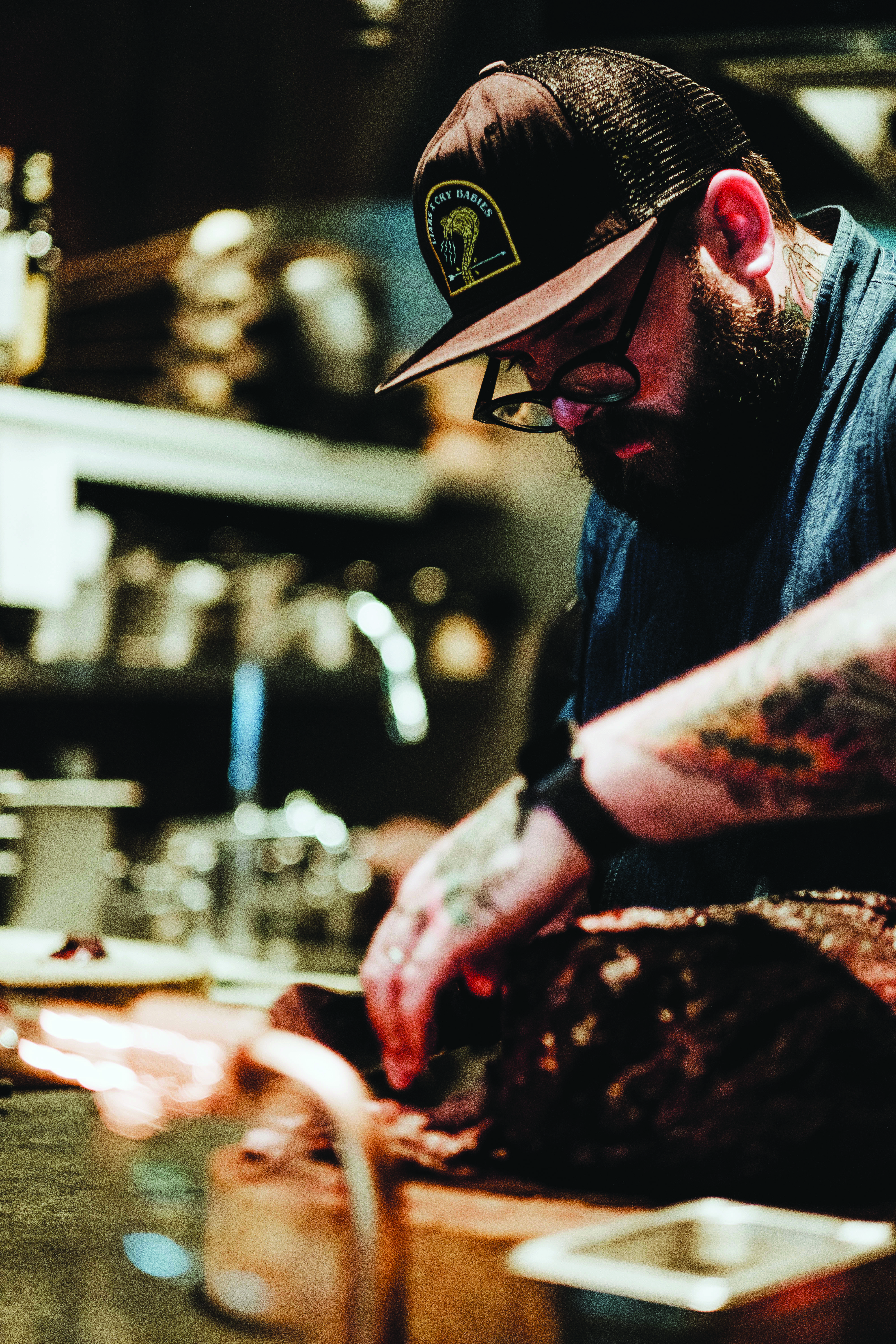 The chef prepares for one of the last services at Rhoda, which was known for its nose-to-tail philosophy