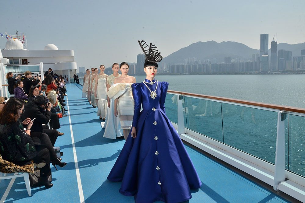 Jessica Minh Ahn leads a pack of models aboard the ship