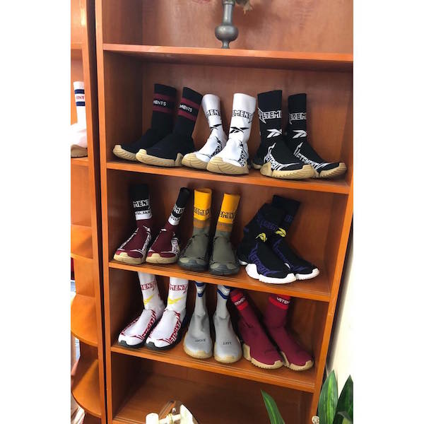 A shelf filled with Sock Sneakers with the caption “#VETEMENTSxREEBOK FALL-WINTER 2019 PREVIEW