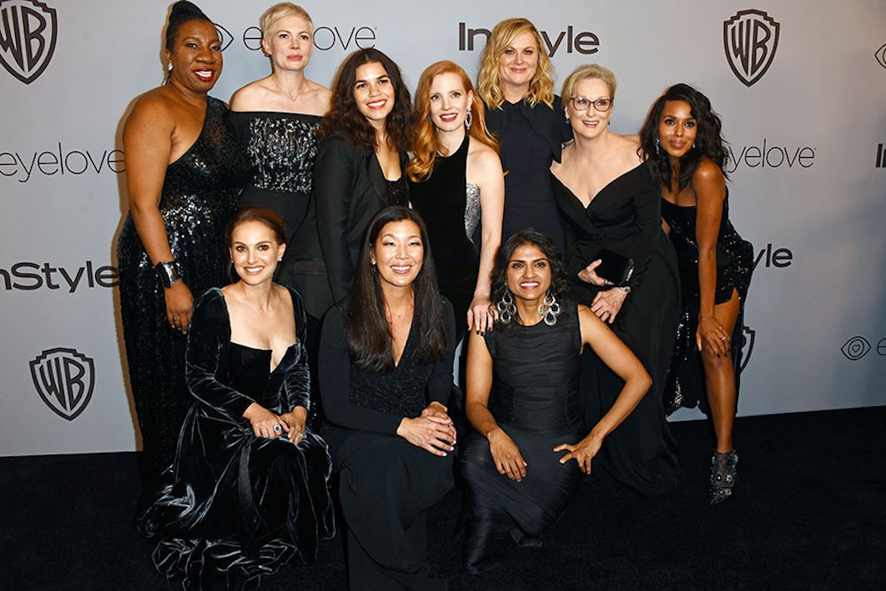 Celebrities and activists wearing black in support of the Times' Up movement on the 2018 Golden Globes Red Carpet