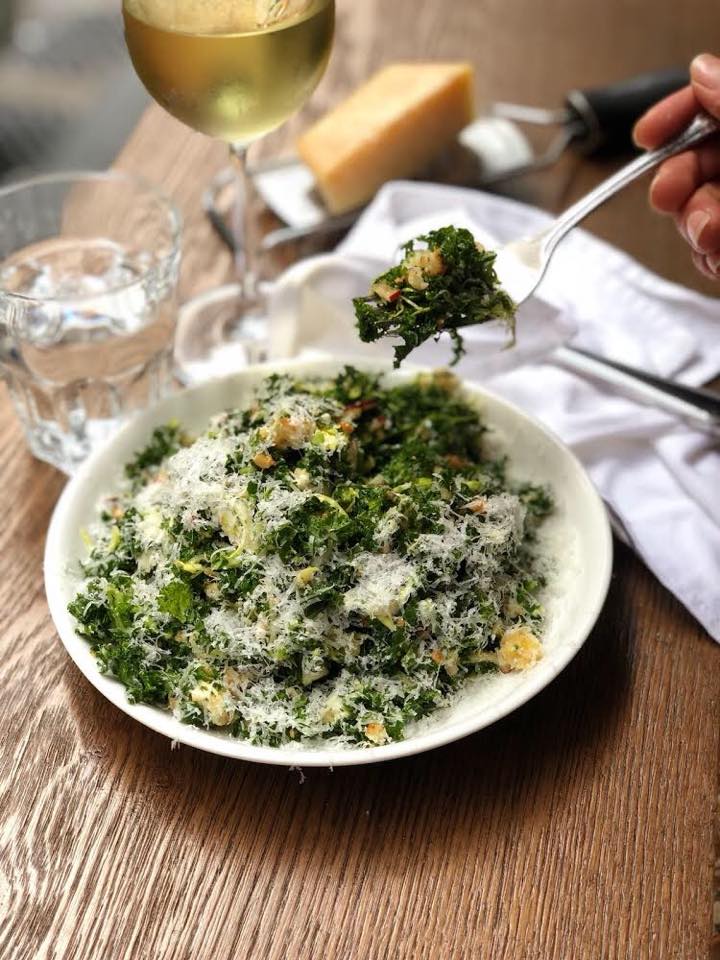 Chopped kale tossed in a zingy orange chili vinaigrette 