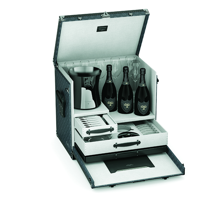 The full Malle Dom Pérignon trunk set