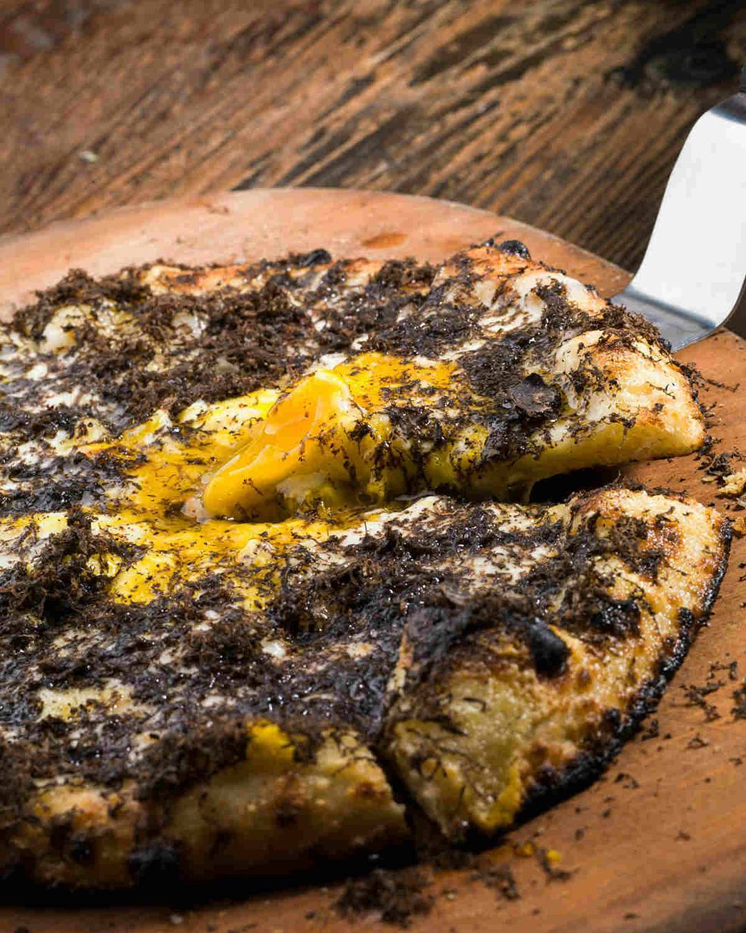 Mercato's truffle, egg and cheese bomb of a pizza