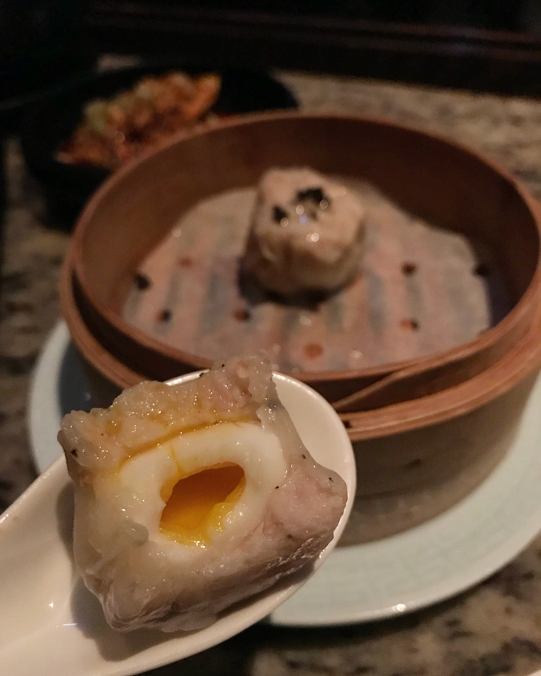 Mott 32's truffle siu mai with quail egg (Photo: kamyvi)