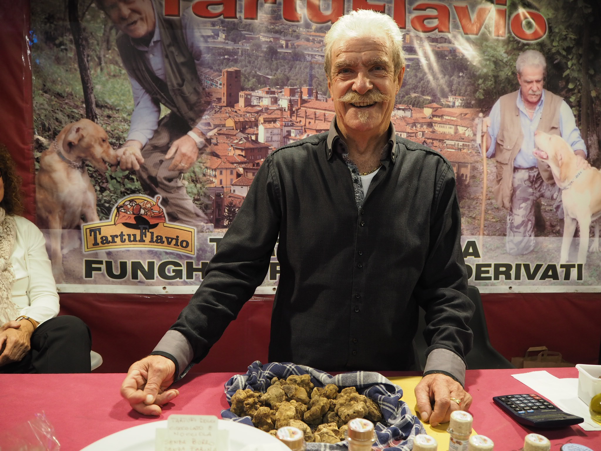 A truffle seller at the Alba international White Truffle Fair