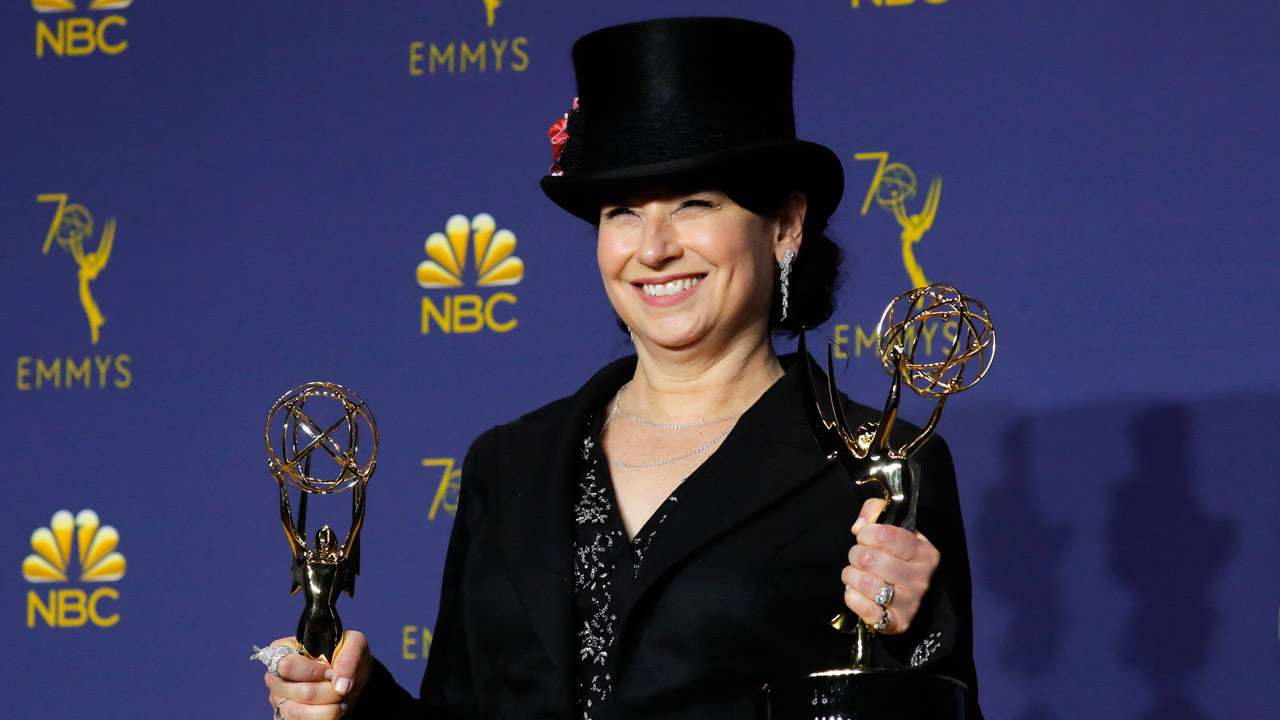 Amy Sherman-Palladino with two of the biggest awards of the night (photo: Reuters)