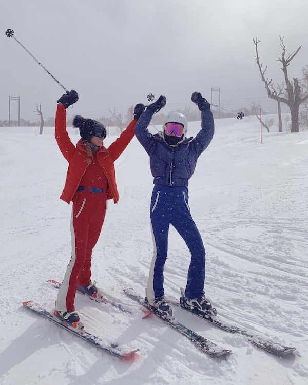 Alison Chan and Antonia Li celebrating a great run. Alison (in red) is wearing Perfect Moment. Antonia Li is in Cordova and Yniq googles. All available at www.theskiproject.co