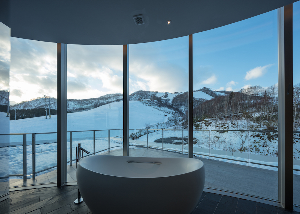Bathroom bathtub views of the ski lifts to the Grand Hirafu at Skye Niseko