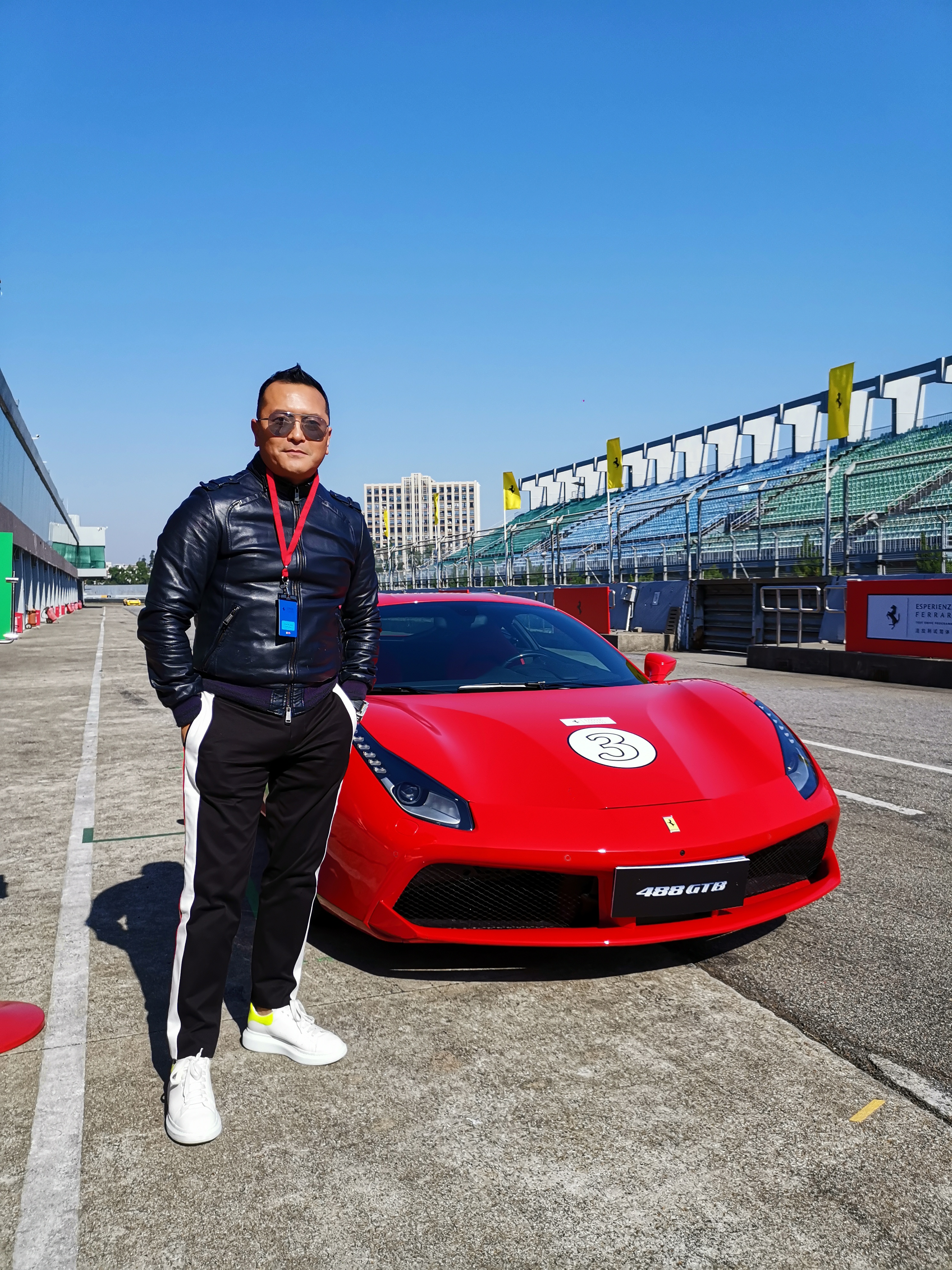 Gordon Lam posing with the Ferrari 488 GTB