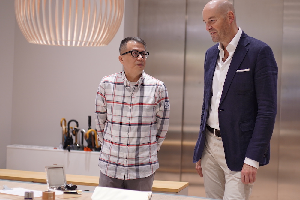 Avid watch collector Kelvin Fung chats with Knoop at the workshop