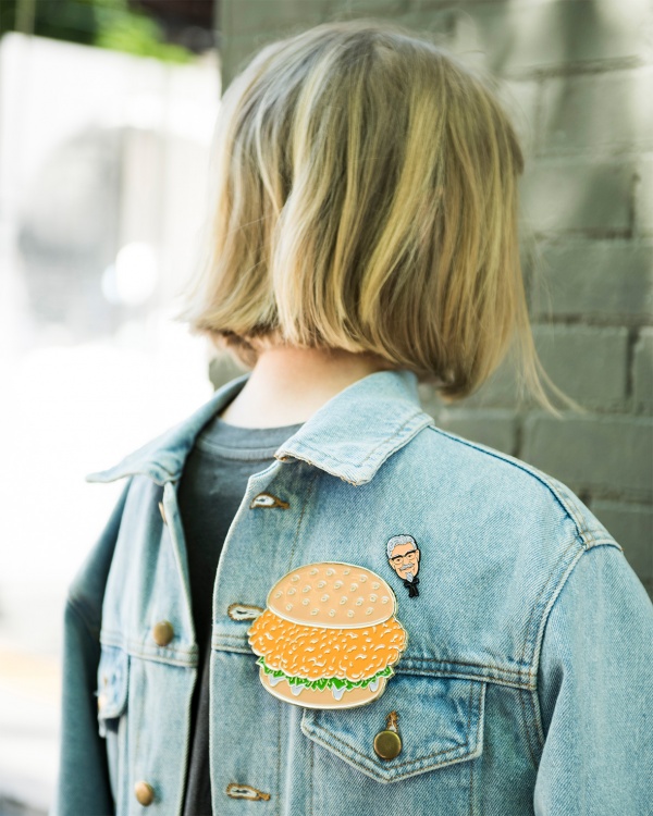 Ironically wear a denim jacket backwards with a life-sized pin of a chicken burger and wait for the street style photographers to come swarming in. 
