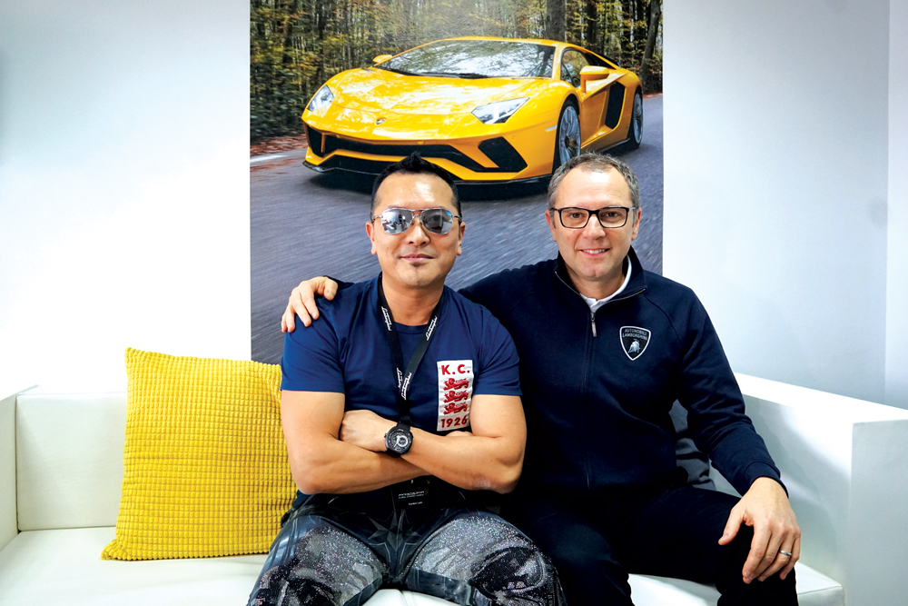 Lamborghini chief executive Stefano Domenicali with Gordon Lam