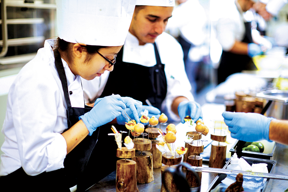 The brothers are accompanied by a team of 40 chefs