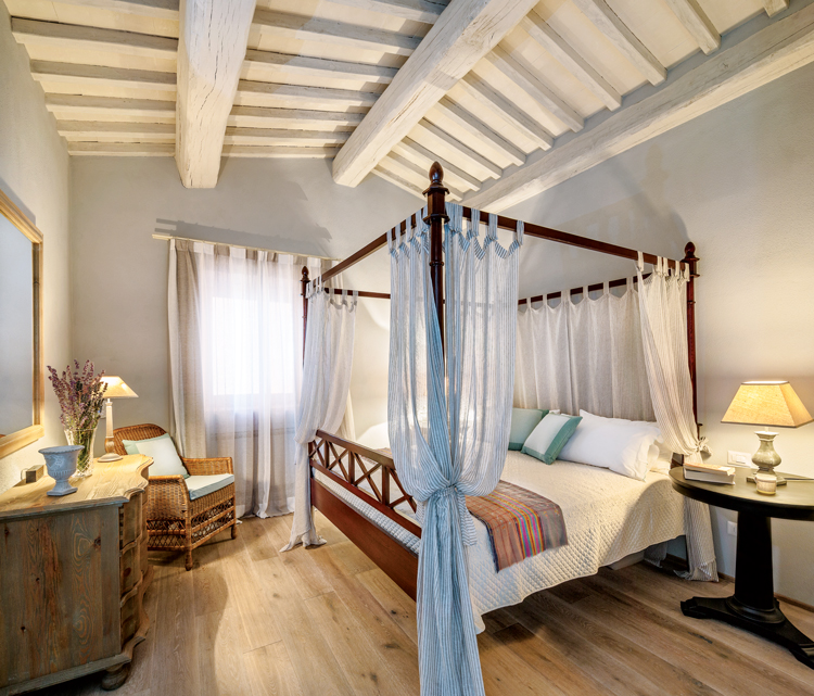 Bedroom featuring a four-poster bed at Villa Santa Croce