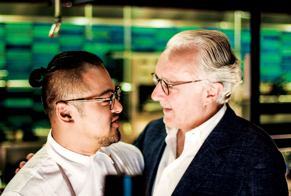 Ho Lee Fook's chef Jowett Yu shares an embrace with the legendary Alain Ducasse