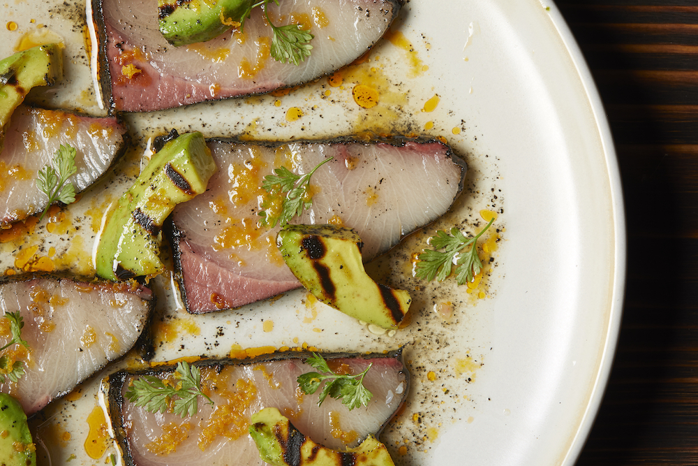 Mr Brown's signature dish raw hamachi with a leek ash crust and grilled avocado