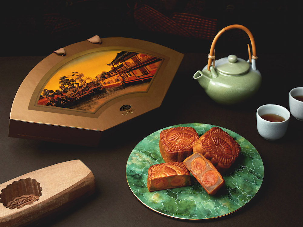 The Mandarin Cake Shop mooncakes packaged in a new fan-shaped gift box