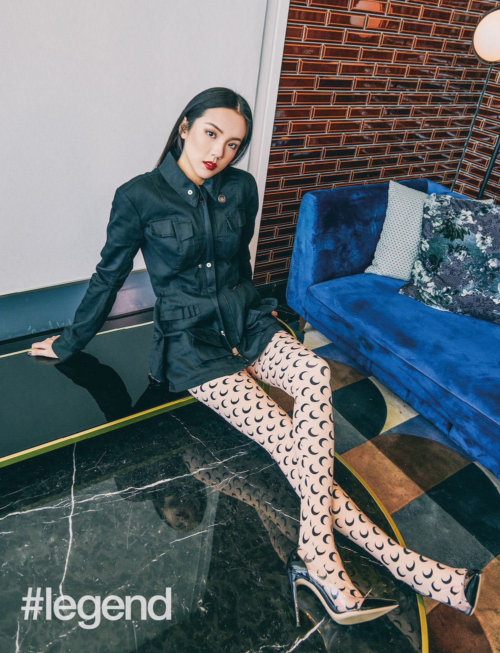 Printed leggings and black army jacket _ Marine Serre, by Joyce; Black shoes by Gianvito Rossi
