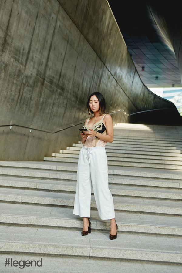 Aimee Song poses in Louis Vuitton