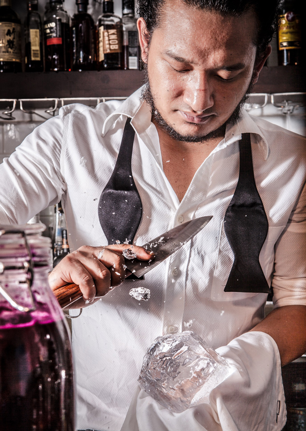 Gurung super casually hacking into a block of ice at Stockton