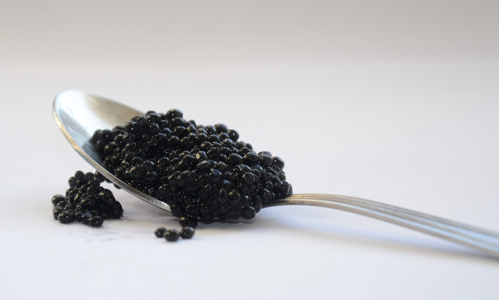 Warning: never scoop your caviar with a metal spoon - it will damage the delicate taste! Opt for mother of pearl when you can