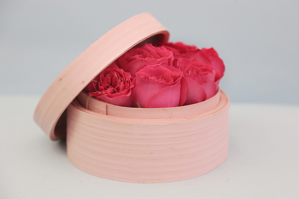 A whimsical offering from BloomBox, delivered in a hand-painted dim sum basket
