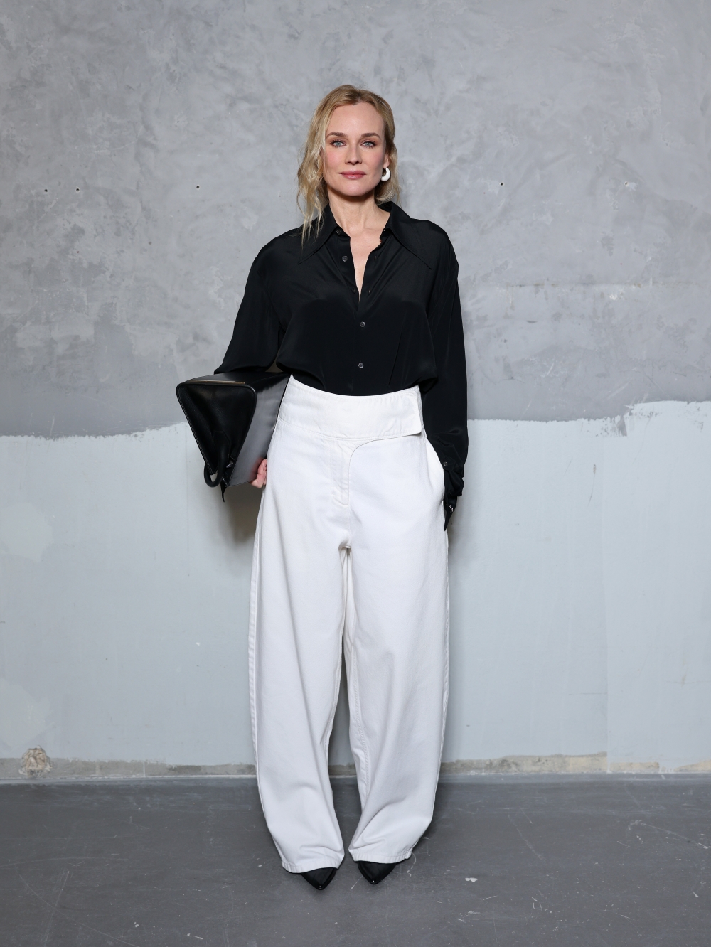 PARIS, FRANCE - JANUARY 21: Diane Kruger attends the Ami Paris Menswear Fall/Winter 2026-2027 show as part of Paris Fashion Week on January 21, 2026 in Paris, France. (Photo by Arnold Jerocki/Getty Images for Ami Paris)