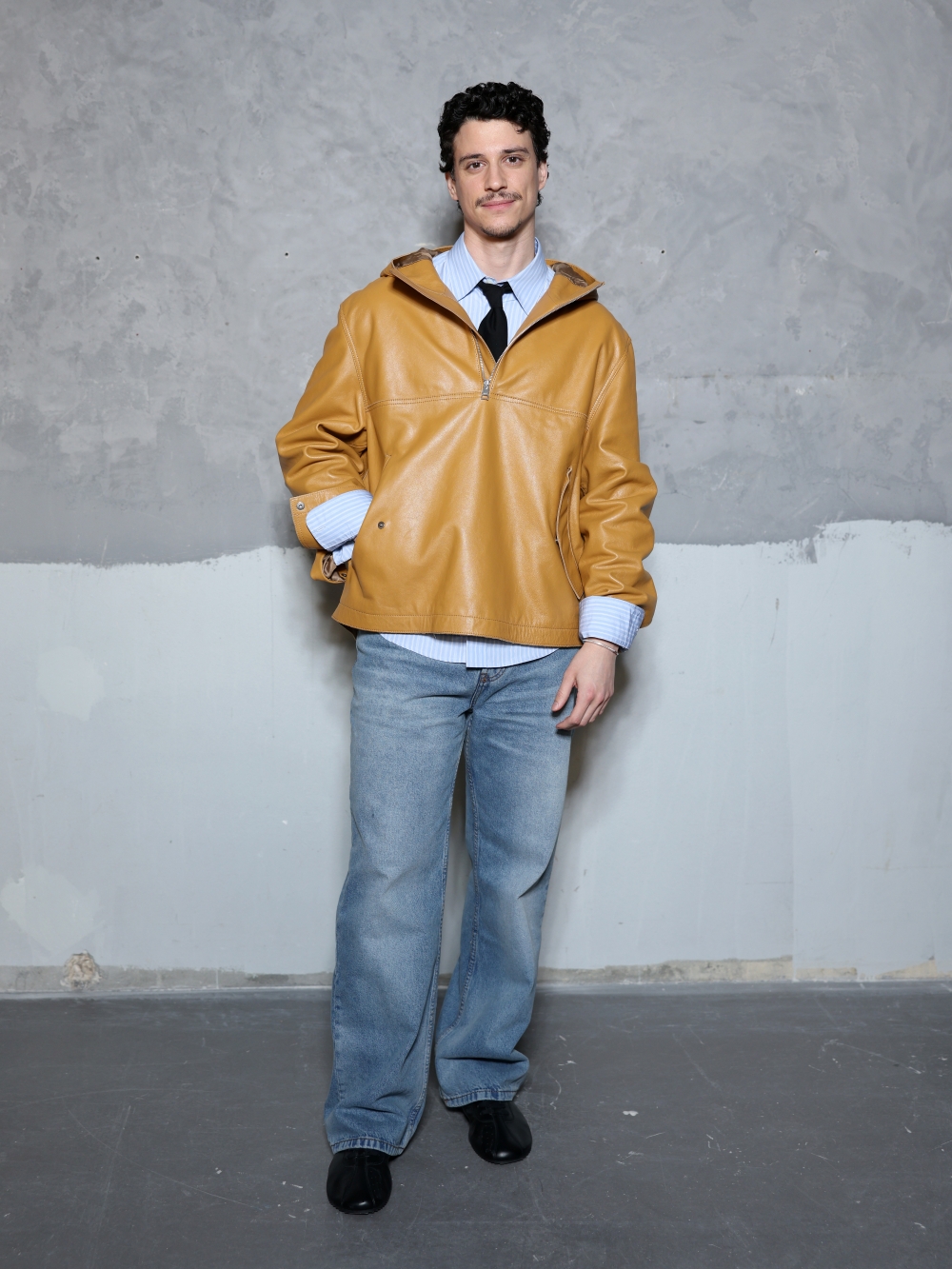 PARIS, FRANCE - JANUARY 21: Adam DiMarco attends the Ami Paris Menswear Fall/Winter 2026-2027 show as part of Paris Fashion Week on January 21, 2026 in Paris, France. (Photo by Arnold Jerocki/Getty Images for Ami Paris)