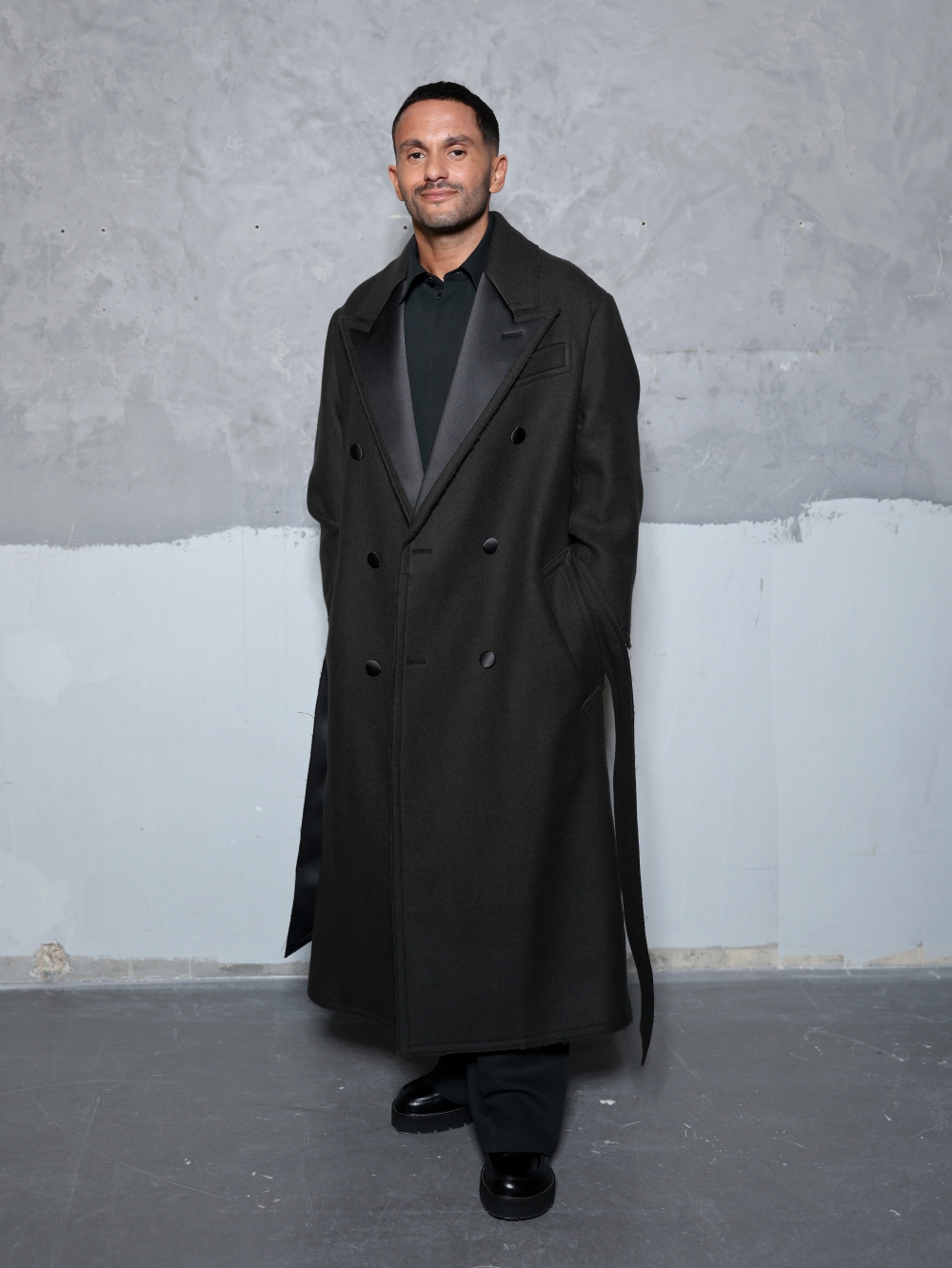 PARIS, FRANCE - JANUARY 21: Malik Bentalha attends the Ami Paris Menswear Fall/Winter 2026-2027 show as part of Paris Fashion Week on January 21, 2026 in Paris, France. (Photo by Arnold Jerocki/Getty Images for Ami Paris)