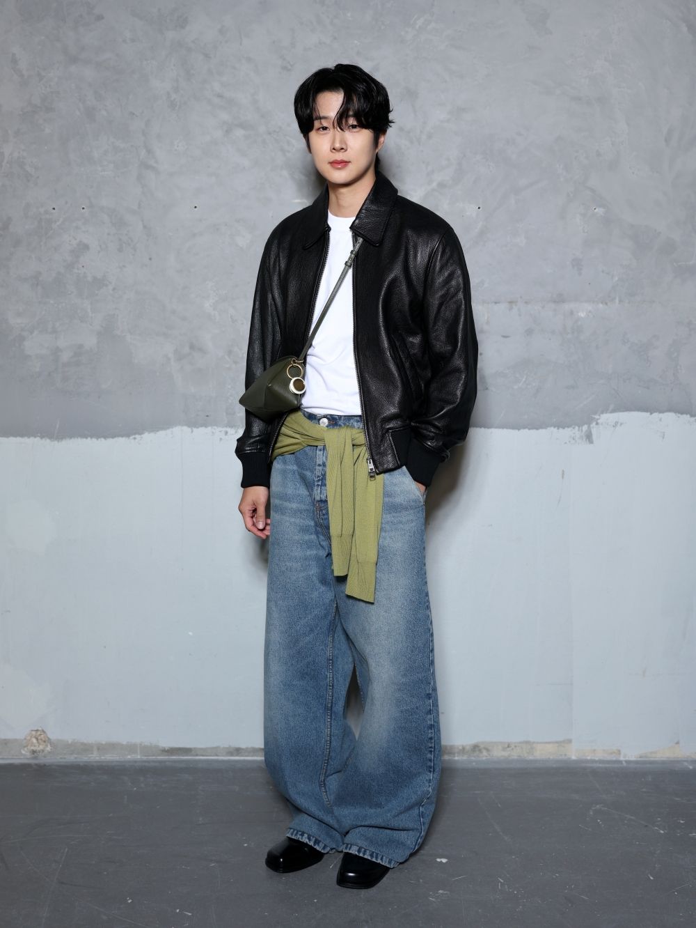 PARIS, FRANCE - JANUARY 21: Choi Woo-shik attends the Ami Paris Menswear Fall/Winter 2026-2027 show as part of Paris Fashion Week on January 21, 2026 in Paris, France. (Photo by Arnold Jerocki/Getty Images for Ami Paris)
