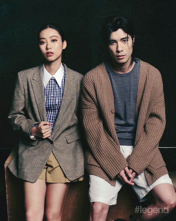 On Jace: Brown check blazer, blue check collared shirt and khaki shorts _ Sandro. On Yan Ting: Beige knit cardigan and shorts, and grey knit jumper _ Sandro.